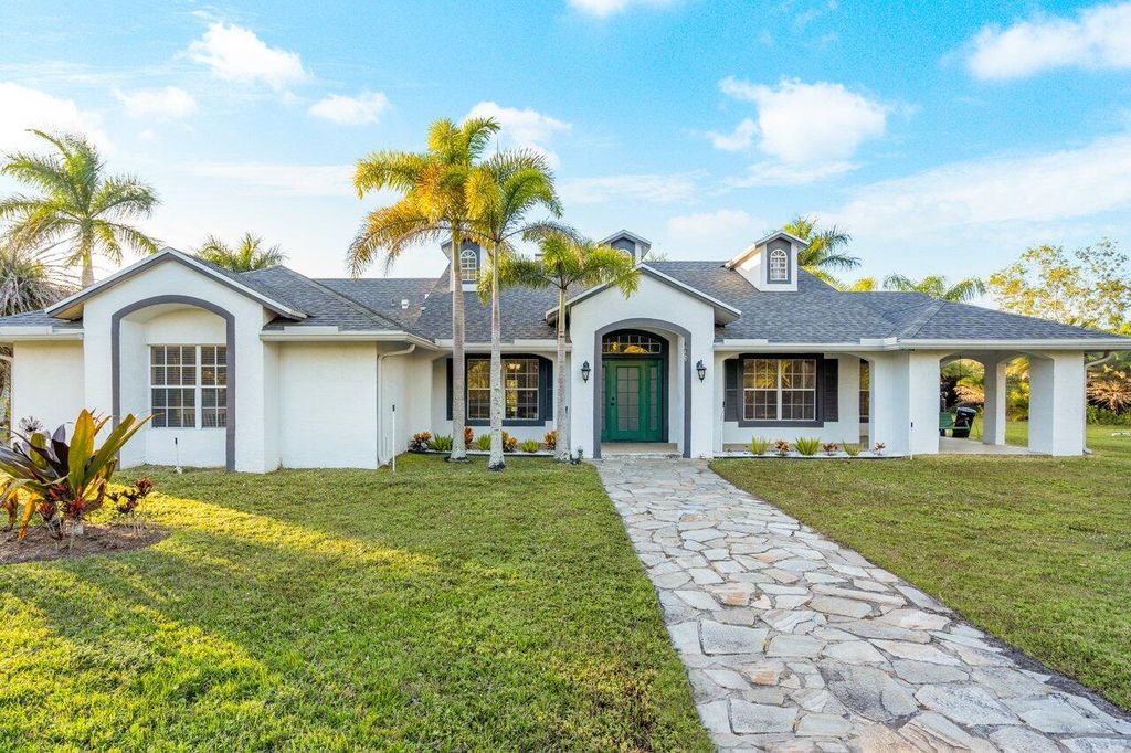 Photo of 12545 Orange Boulevard, West Palm Beach, FL 33412 (MLS # R10958459)