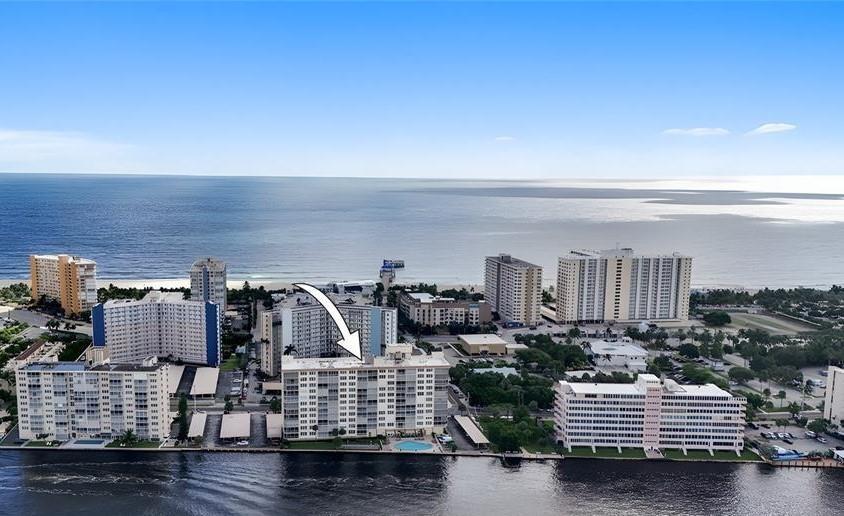 ENJOY SPECTACULAR VIEWS OF THE INTRACOASTAL AND CITY FROM THIS SOUTH CORNER WITH WRAP AROUND BALCONY! ENJOY A BEAUTIFUL SUNRISE FROM THE EAST AND SUNSETS FROM THE WEST! THIS SPACIOUS 2/2 HAS A UNIQUE L-SHAPED LIVING/DINNING ROOM WHICH MAKES IT FEEL MORE LIKE A HOUSE. UPDATED KITCHEN AND BATHS. IMPACT WINDOWS. ENJOY THE SPLIT BEDROOMS FOR GUEST PRIVACY. FRESHLY PAINTED AND MOVE IN READY. FREE LANDRY ROOM JUST A FEW STEPS AWAY. ESA ANIMAL WITH PROPER PAPERWORK WELCOME. LIVE THE FLORIDA LIFESTYLE JUST 2BLOCKS TO THE BEACH, FISHING PIER AND POMPANOS OCEAN FRONT ENTERTAIMENT DISTRICT. JUMP ON THE WATER TAXI RIGHT NEXT DOOR. SUPURB BUILDING. NEW ROOF IN 2024, 50YR MILDSTONE CONSTRUCTION IS PAID FOR AND NOW UNDERWAY.