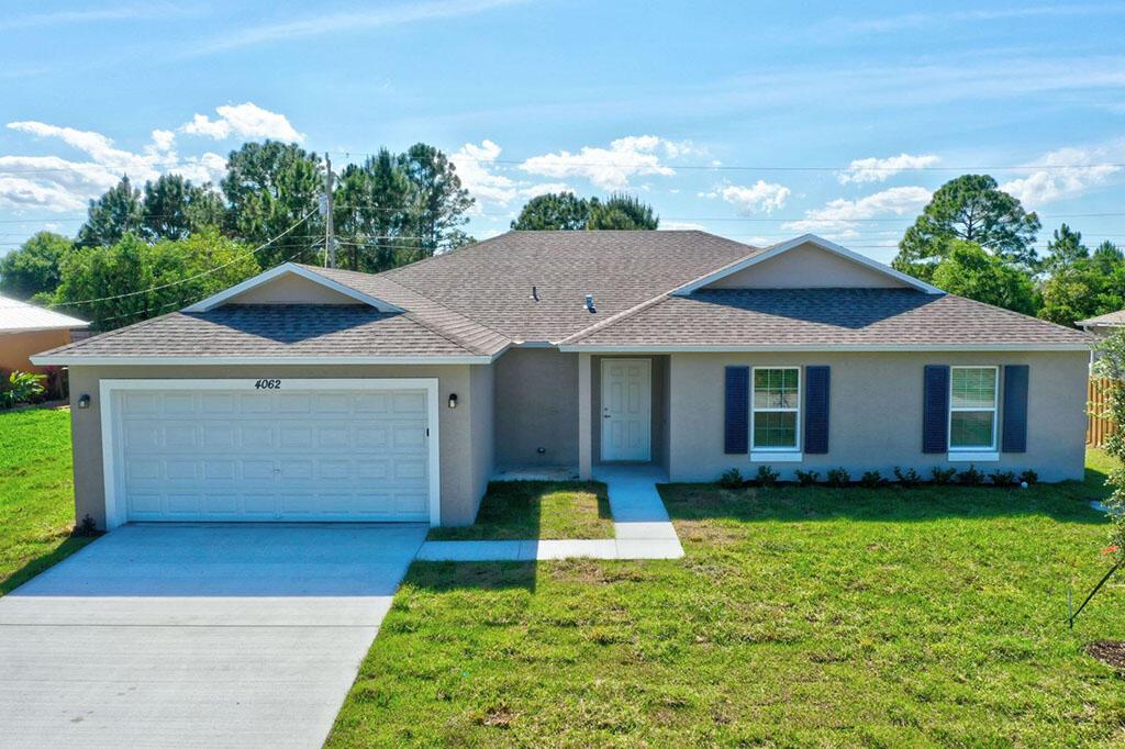 This meticulously designed single- family residence offers over 1900 sqft of comfortable living space. Vaulted ceilings and natural light create an inviting atmosphere. The kitchen features solid surface countertops, stainless steel appliances, and ample cabinetry. With four bedrooms, including a master suite with his and hers closets, and two bathrooms with modern fixtures, tub and standing shower. Energy-efficient features include double-pane, insulated low-E windows and sliders, along with a high-efficiency AC system, 40 gal quick recovery tank. Step outside to a covered patio with ample yard space. Minimum credit 650 required and background check. Home is vacant and professionally cleaned.