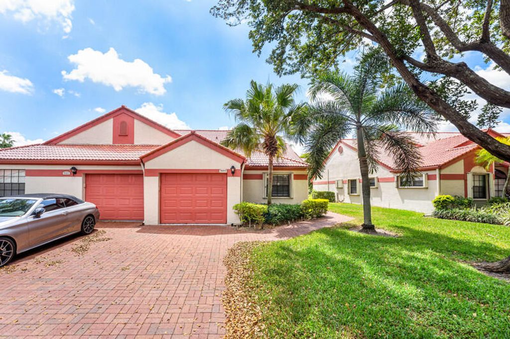 Photo of 7888 Lexington Club Boulevard #B, Delray Beach, FL 33446 (MLS # B26011221)