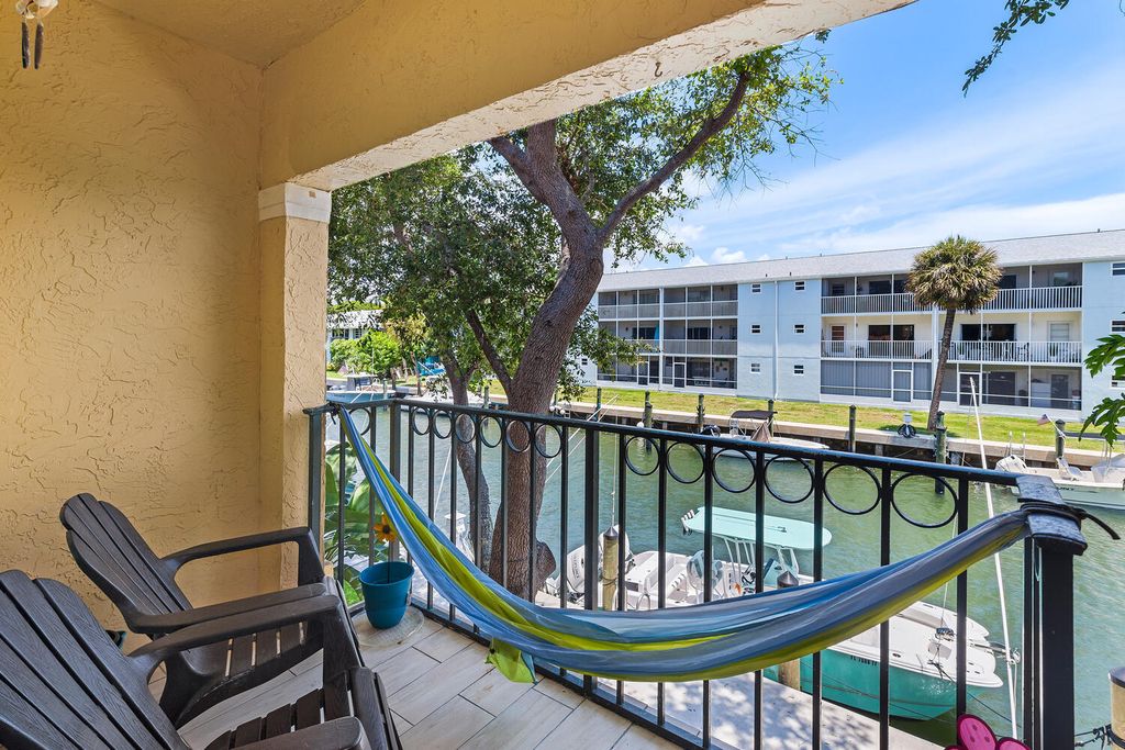 Photo of 1125 Lake Shore Drive Dr #202, Lake Park, FL 33403 (MLS # R10810787)