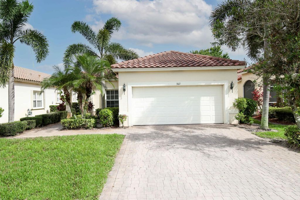 Photo of 307 NW Breezy Point Loop, Port Saint Lucie, FL 34986 (MLS # R11099118)