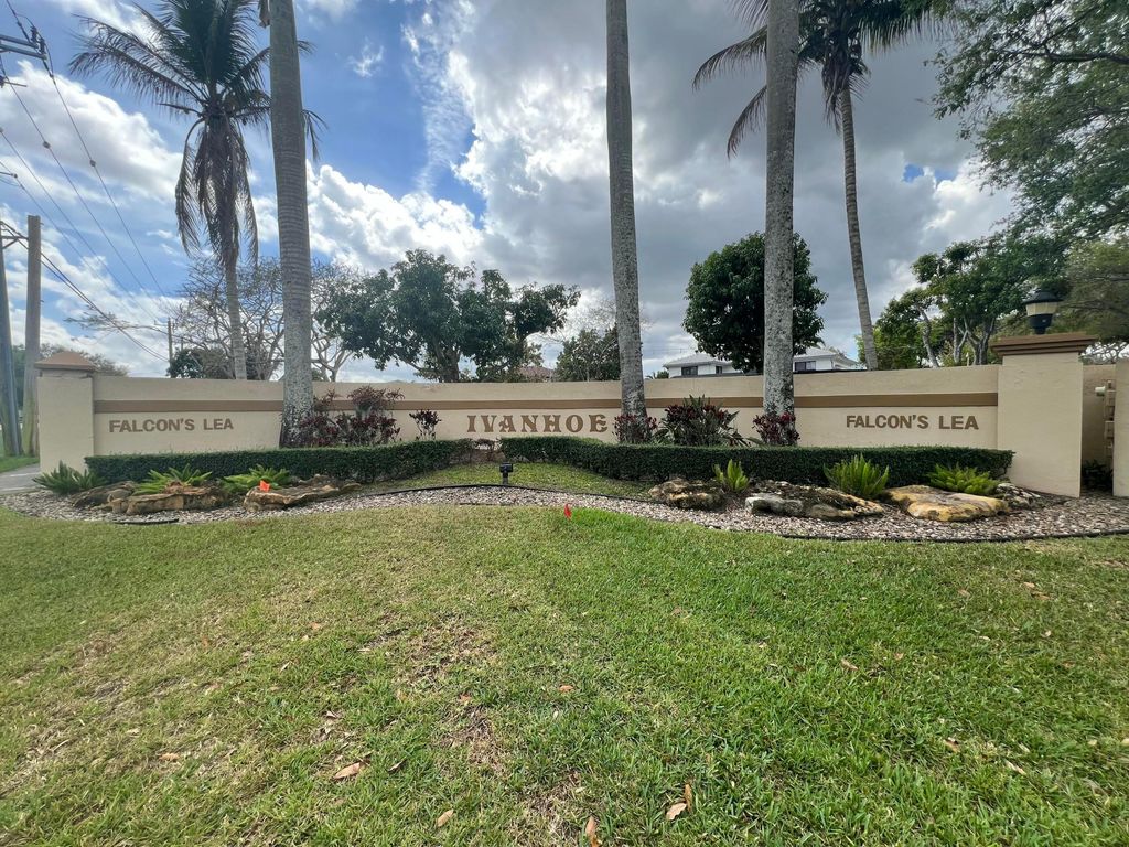 Photo of 15010 E Falcons Lea Dr, Davie, FL 33331 (MLS # B26000913)