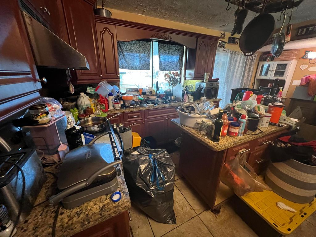 Photo of 15010 E Falcons Lea Dr, Davie, FL 33331 (MLS # B26000913)