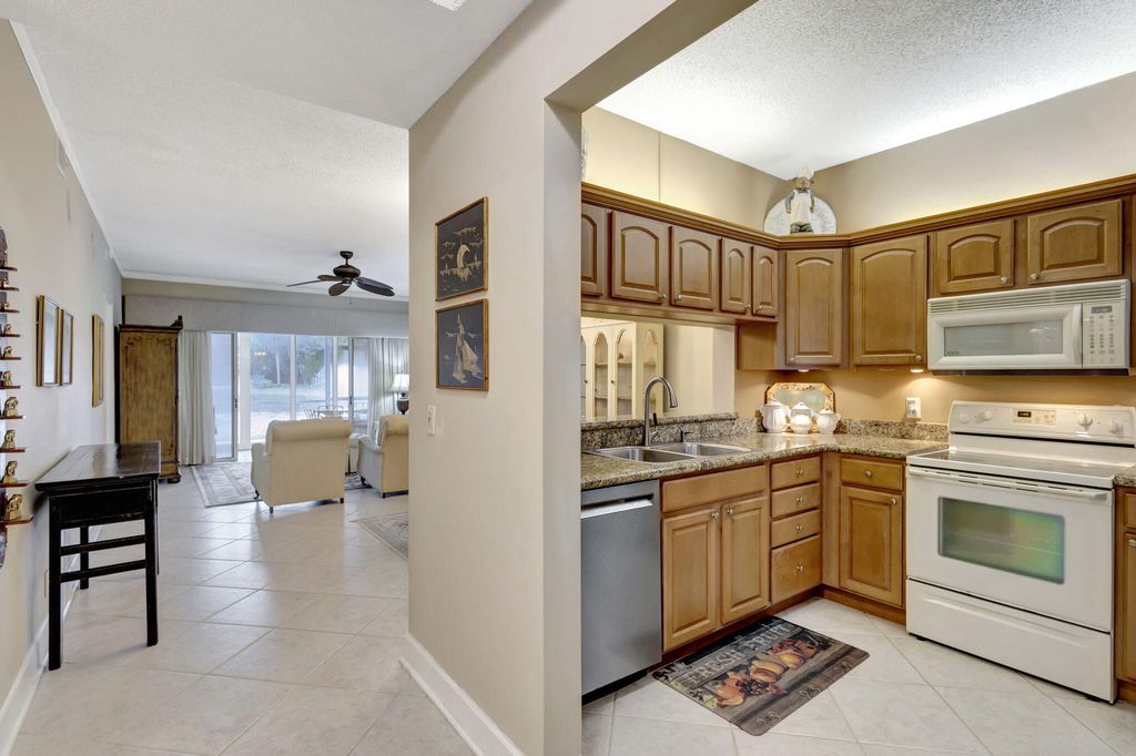 Photo of 113 Cypress Point Drive, Palm Beach Gardens, FL 33418 (MLS # R11159275)