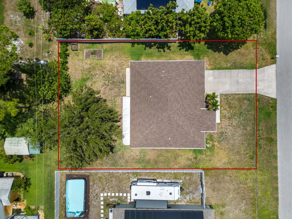 Photo of 1981 SW Delmonico Avenue, Port Saint Lucie, FL 34953 (MLS # R10991200)