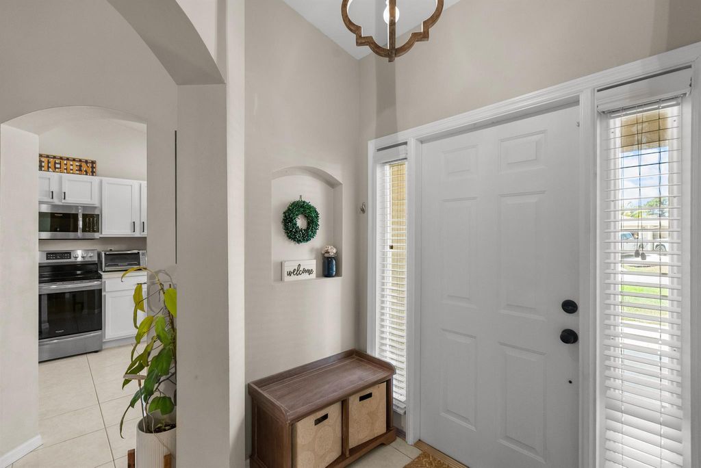 Photo of 1981 SW Delmonico Avenue, Port Saint Lucie, FL 34953 (MLS # R10991200)