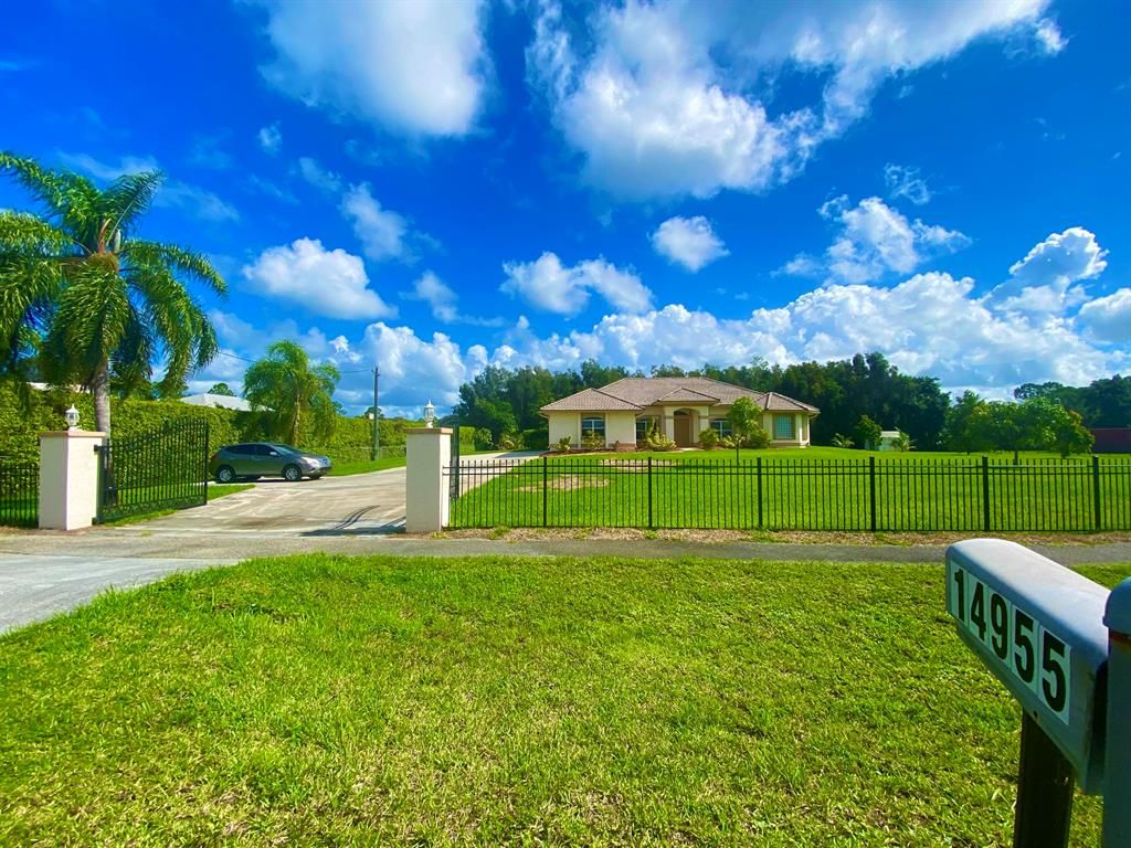 Photo of 14955 Key Lime Boulevard, Loxahatchee, FL 33470 (MLS # R10731676)