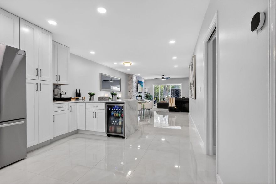 Deeded private boat dock just steps from your back door and deeded parking directly in front of the unit. Turnkey first floor waterfront living in blue chip East Boca. Less than two miles to the beach and Mizner Park and a short drive to Atlantic Avenue in Delray Beach.

Boat to Lake Boca. Dock at Banana Boat for dinner. Kayak or paddle board through Lake Wyman and along the Intracoastal. Hurricane impact windows and doors. New AC, water heater, and Bosch appliances. Assessments paid. New pool coming.

Live the $3M waterfront lifestyle for a fraction of the cost