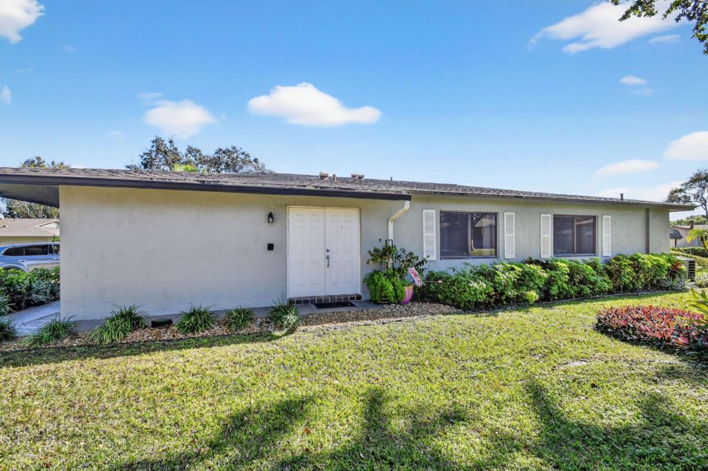 Photo of 1544 Palmland Drive, Boynton Beach, FL 33436 (MLS # R11161448)