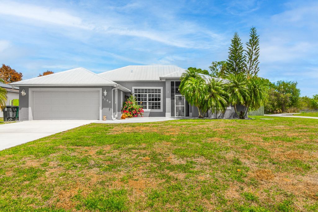 Photo of 2149 SW Savage Boulevard, Port Saint Lucie, FL 34953 (MLS # B26010529)