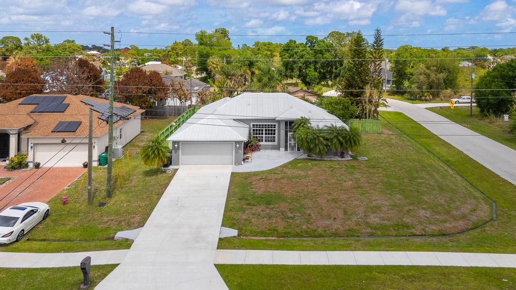 Photo of 2149 SW Savage Boulevard, Port Saint Lucie, FL 34953 (MLS # B26010529)