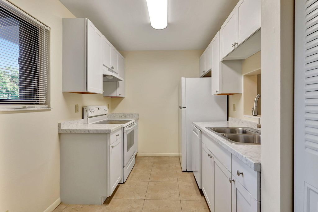 Photo of 120 NW 70th Street, Boca Raton, FL 33487 (MLS # B26014289)