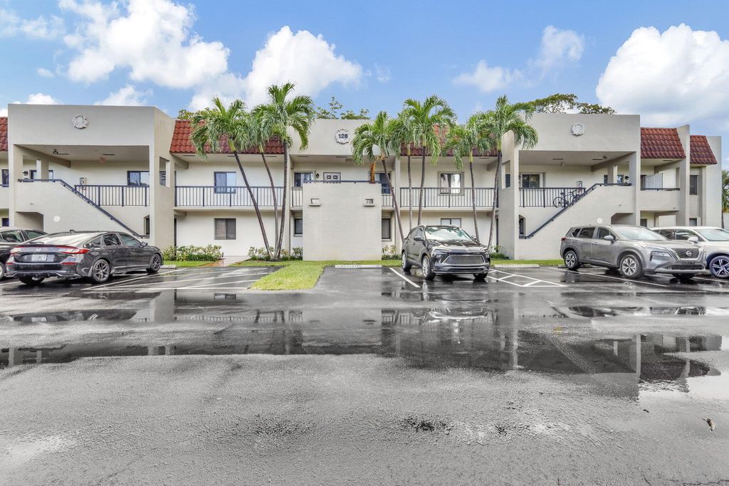 Photo of 120 NW 70th Street, Boca Raton, FL 33487 (MLS # B26014289)