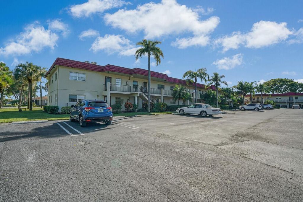 Photo of 6 Abbey Lane #201, Delray Beach, FL 33446 (MLS # R10949486)