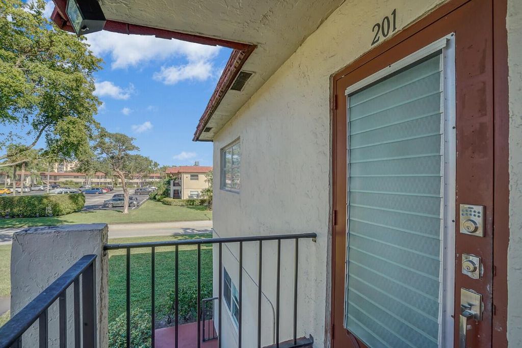 Photo of 6 Abbey Lane #201, Delray Beach, FL 33446 (MLS # R10949486)