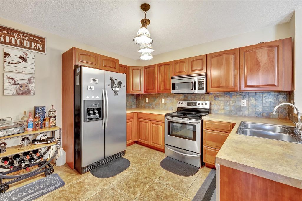 Photo of 5821 Riverside Drive #304B2, Coral Springs, FL 33067 (MLS # F10469583)