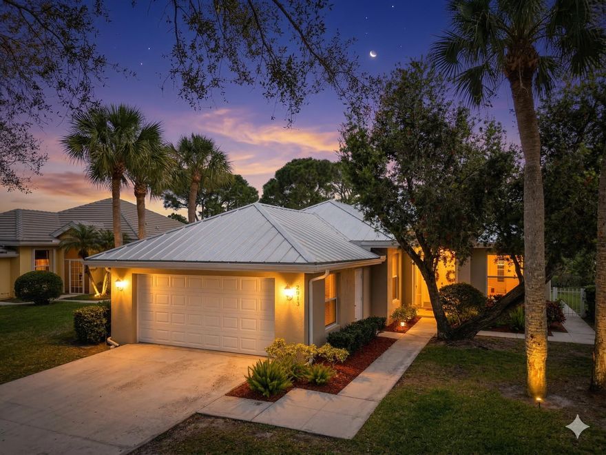 Welcome to this solid DiVosta "Hampton" model in the 24/7 guard-gated Meadows at Martin Downs! This true single-family detached home offers 3 beds, 2 baths, a 2-car garage, and 1,952 SFAC. Enjoy peace of mind with poured-concrete construction and a 2017 metal roof. The bright interior features soaring volume ceilings, skylights, and a desirable split-floor plan. A beautifully updated kitchen flows into the breakfast area and a large formal dining room. The primary suite is a private retreat tucked at the rear. Step outside to an expansive open patio. The Meadows offers resort-style amenities: a heated pool, tennis, basketball, and a playground. Zoned for top-rated Martin County schools with NO mandatory equity club fees! Schedule your showing today.