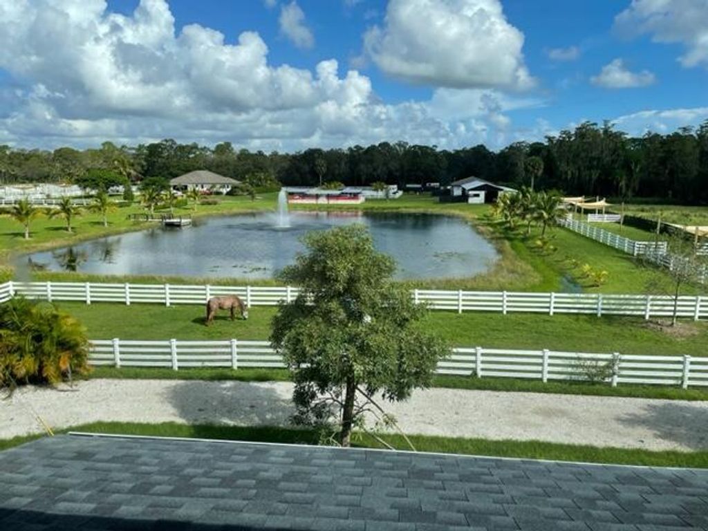 Photo of 17120 Jupiter Farms Road #D, Jupiter, FL 33478 (MLS # R10926836)