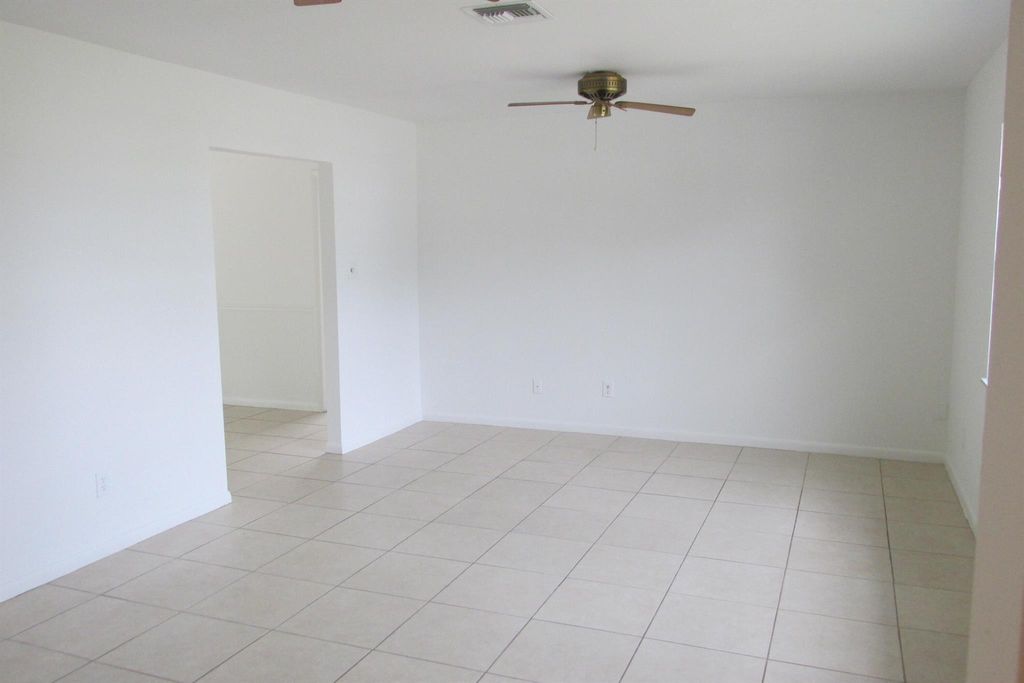 Photo of 110 SE Crosspoint Drive, Port Saint Lucie, FL 34983 (MLS # R10988934)