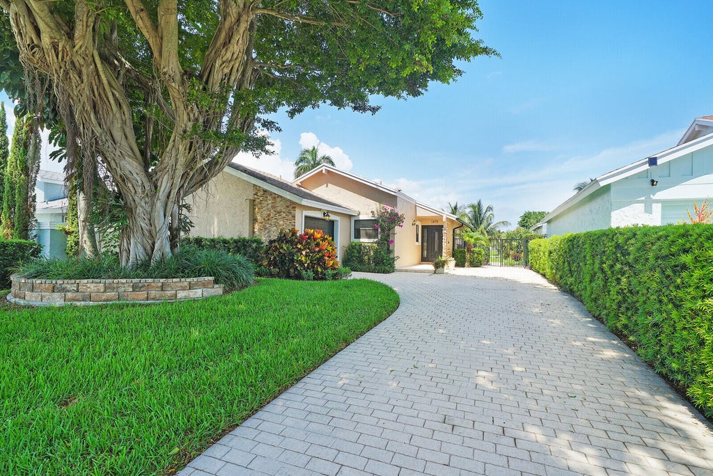 Photo of 1875 NW 10th Street, Delray Beach, FL 33445 (MLS # B26077254)