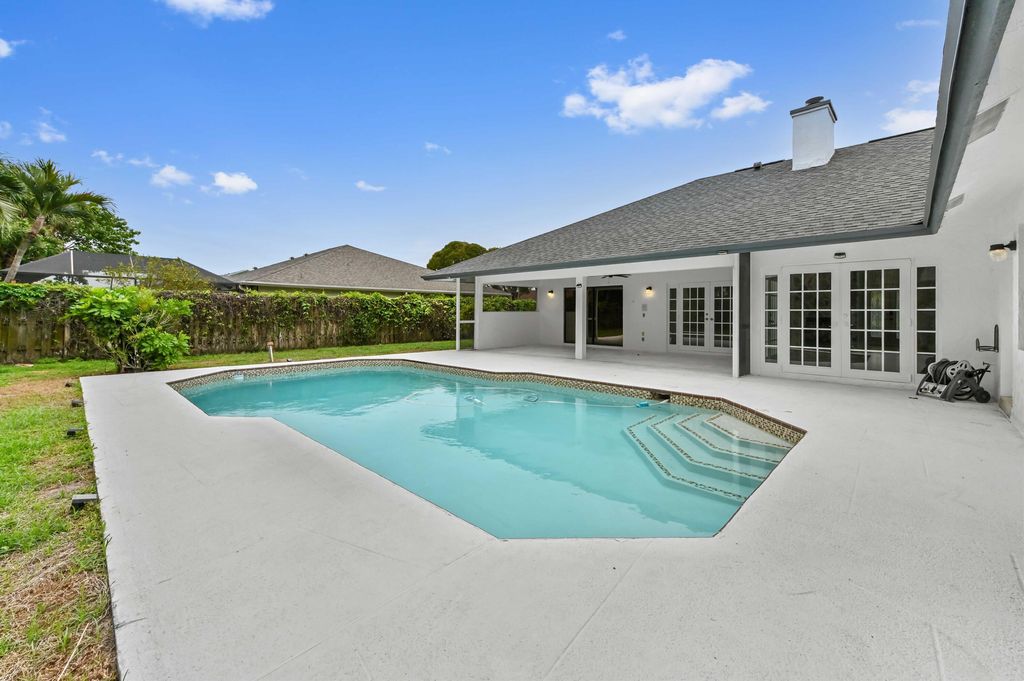 Photo of 13772 Ishnala Circle, Wellington, FL 33414 (MLS # B26004111)