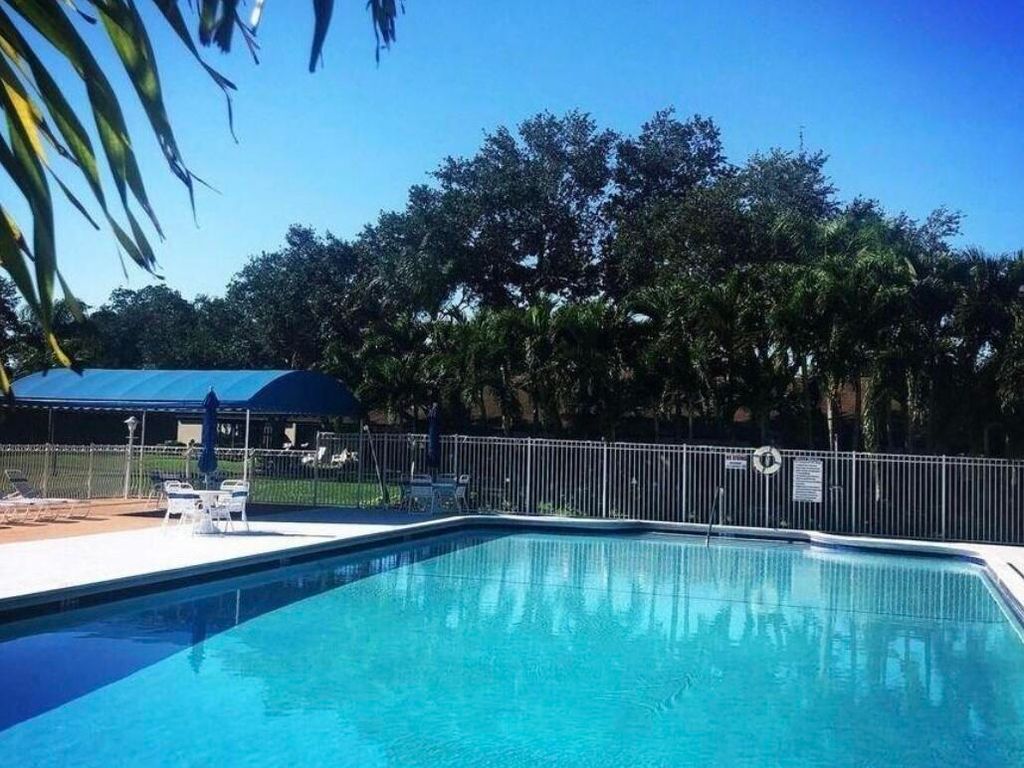 Photo of 542 Shady Pine Way #D, Greenacres, FL 33415 (MLS # R11164847)