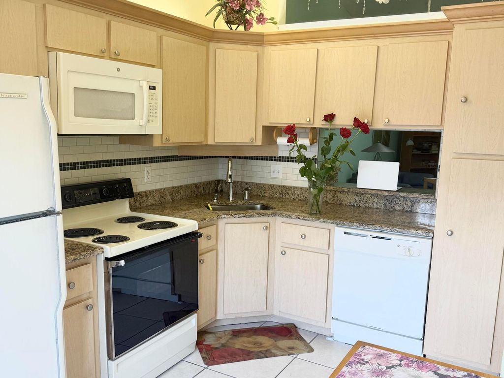 Photo of 542 Shady Pine Way #D, Greenacres, FL 33415 (MLS # R11164847)