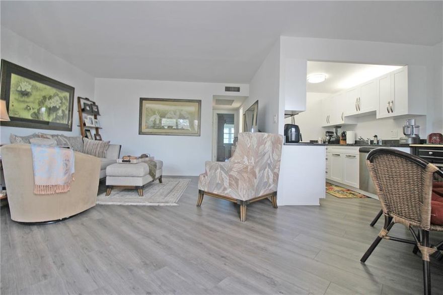 UPDATED & READY TO MOVE RIGHT IN!! THIS 4TH FLOOR, 2 BED, 1.5 BATH WON'T LAST LONG! GORGEOUS KITCHEN WITH WHITE SHAKER CABINETS, GRANITE COUNTER TOPS, S.S. APPLIANCES AND DOUBLE SINK!! HWH & A/C JUST 2 YEARS OLD!! PLANK VINYL FLOORING THRU-OUT! FRESHLY PAINTED AND FURNISHED (BEDROOM SET NOT INCLUDED)!! UPDATED BATHROOMS W/SHOWER STALL IN PRIMARY BATH! NO POPCORN CEILINGS HERE!! ENCLOSED PATIO HAS EXTRA STORAGE! OWNER HAS DEPOSIT ON HURRICANE DOOR AND WINDOWS! CENTURY VILLAGE EAST IS A GUARD GATED COMMUNITY WITH FREE TRANSPORTATION INSIDE AND OUT!! IT'S LAVISH CLUBHOUSE FEATURES CLASSES, CLUBS, FREE MOVIES, BROADWAY SHOWS & STATE OF THE ART GYM!! 10 MINUTES TO THE OCEAN! CLOSE TO FABULOUS SHOPPING, MAJOR HWYS AND GREAT RESTAURANTS! ASSOC. CLAIMS 55+.