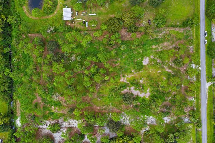 5 ACRE lot, located on paved dead end rd in the highly sought after community of Wildwood. Partially cleared, high and dry, fenced in. Conveniently located close to Wellington and Polo grounds.