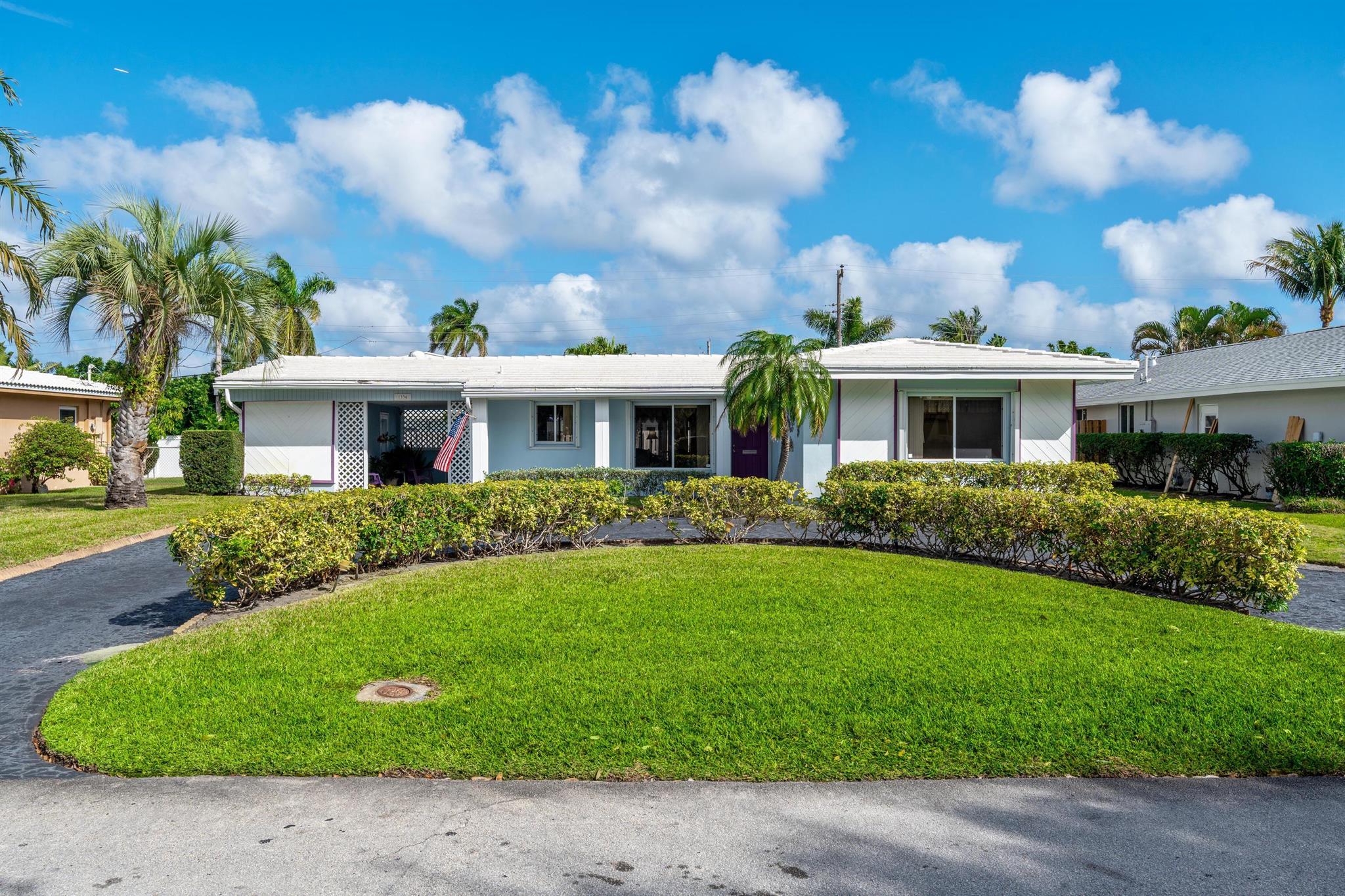 Charming Single-Family Home in Pompano Beach. Welcome to 1330 SE 6th Terrace, a 2-bedroom, 2-bathroom home with 1,295 sq. ft. under air, offering incredible potential for its next owner. This home features good bones and is nestled in a no-HOA community known for its stability and neighborly charm. The fully fenced backyard provides privacy and space for outdoor activities, while the U-shaped driveway adds convenience and curb appeal. A covered carport is currently used as a cozy outdoor seating area, perfect for relaxing or entertaining. Located just 2.5 miles from the beautiful Pompano Beach public beach, you'll enjoy quick access to sun, sand, and surf.