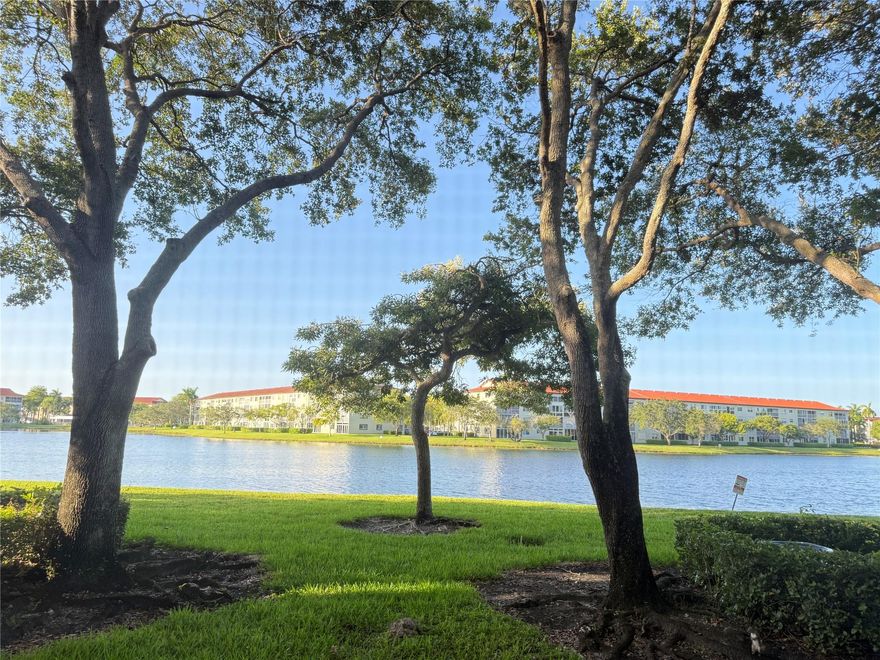 LAKE VIEW- Spacious ground floor Nandina model, ideally located just steps from the mailboxes, the community pool, and the back gate of Pembroke Pines, with your assigned parking space right in front and plenty of guest parking. This unit offers a blank canvas to make it your own and add your personal style. Located in a desirable 55+ community, it’s an excellent opportunity for full-time living.  Residents enjoy a wide range of amenities including multiple pools, a clubhouse, movie theater, billiards, scheduled movies, security patrols, and transportation services, making this a vibrant and convenient place to call home. As per the Association, no rentals within  the first year of ownership, 650 minimum credit score required. Water, cable & internet include in the maintenance fee.