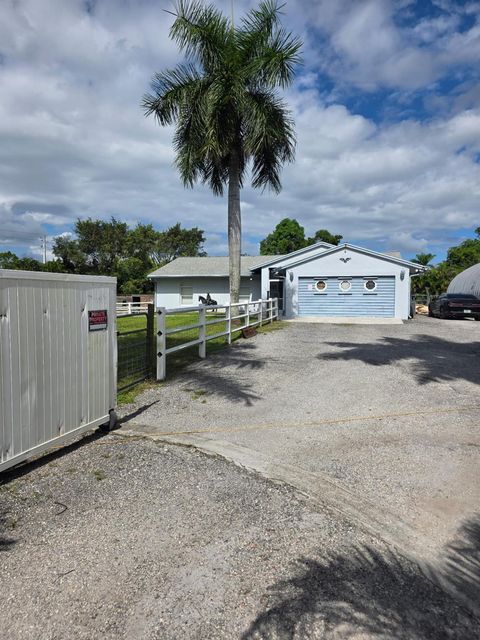 Photo of 13997 76th Road N, West Palm Beach, FL 33412 (MLS # R11134954) Photo of 13997 76th Road N, West Palm Beach, FL 33412 (MLS # R11134954)