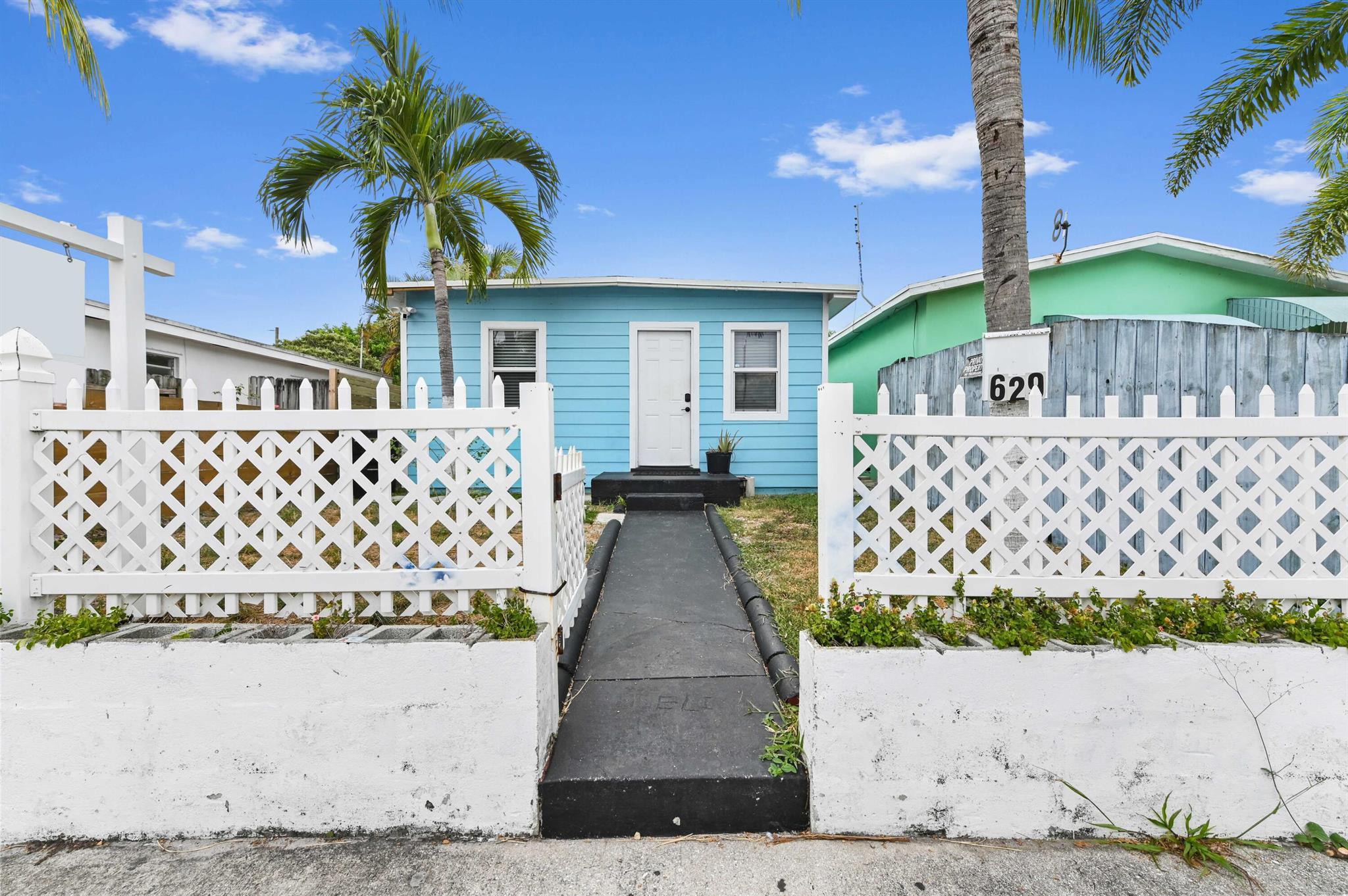 :Two houses for the price of one! This unique property offers no HOA and great investment potential. Make one your home and rent out the other! The main home features 2 bedrooms and 1 baths with 720 sqft of living space, while the second home offers 336 sqft of a studio bedroom layout. Interiors feature tile and laminated flooring, a kitchen equipped with appliances and cabinets for storage. Enjoy outdoor living with a fenced backyard and open patio perfect for relaxing or entertaining.