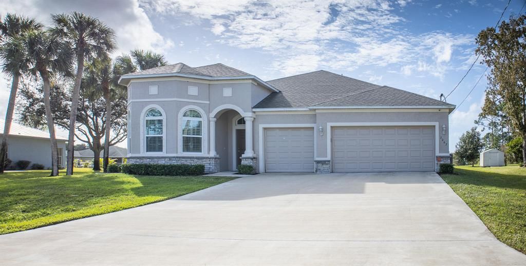 Photo of 2062 SW Justison Avenue, Port Saint Lucie, FL 34953 (MLS # R10683217)