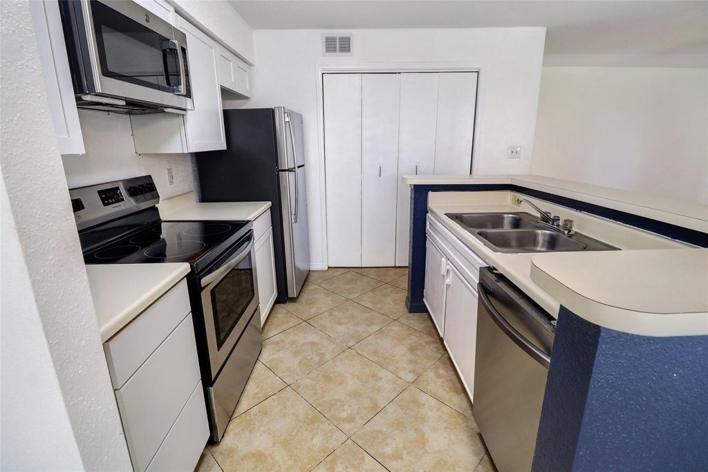 Photo of 777 Riverside Drive #1516, Coral Springs, FL 33071 (MLS # F10554370)