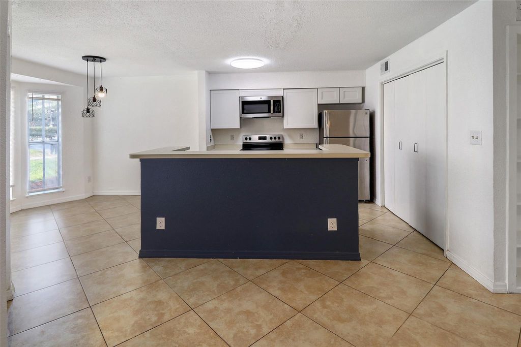 Photo of 777 Riverside Drive #1516, Coral Springs, FL 33071 (MLS # F10554370)