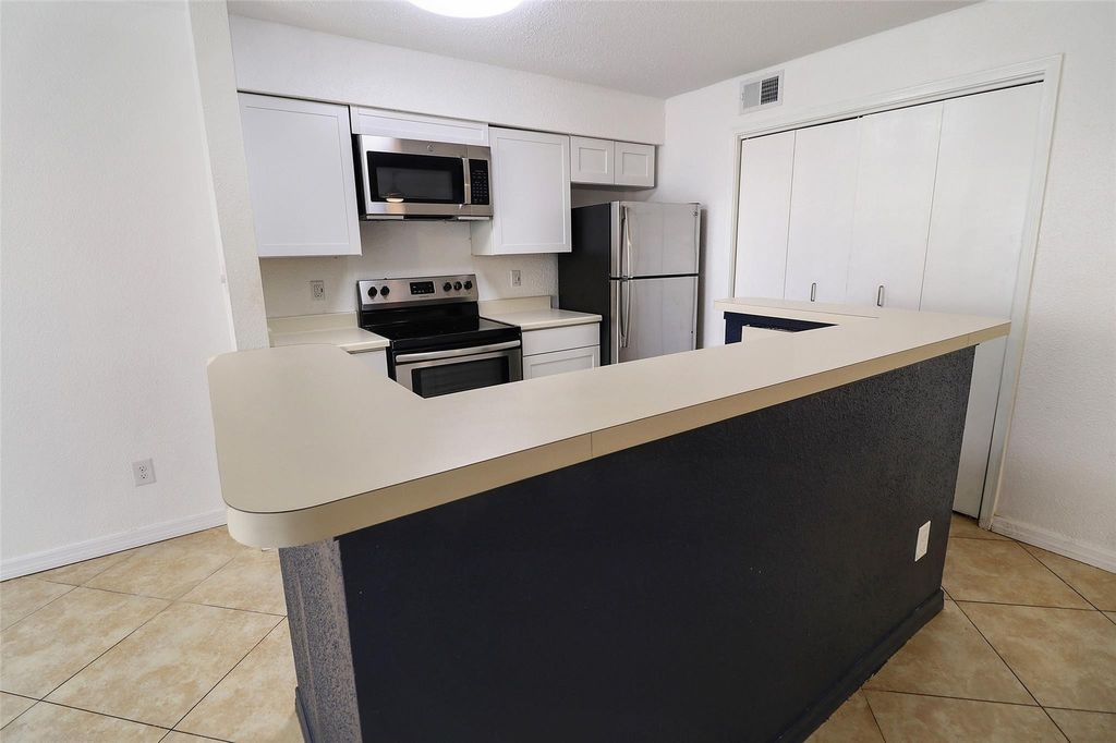 Photo of 777 Riverside Drive #1516, Coral Springs, FL 33071 (MLS # F10554370)