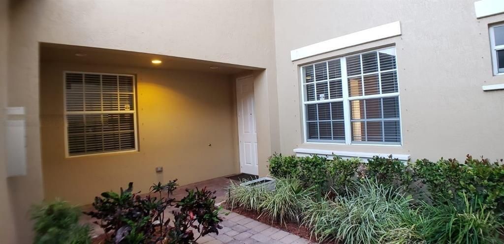 Photo of 8207 NW 128th Lane #18-b, Parkland, FL 33076 (MLS # B26038097)