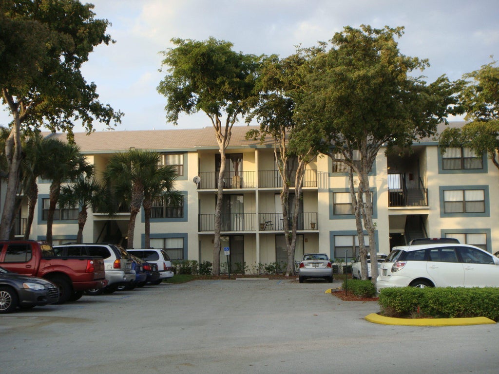 Photo of 752 EXECUTIVE CENTER Drive #112, West Palm Beach, FL 33401 (MLS # B26079268)