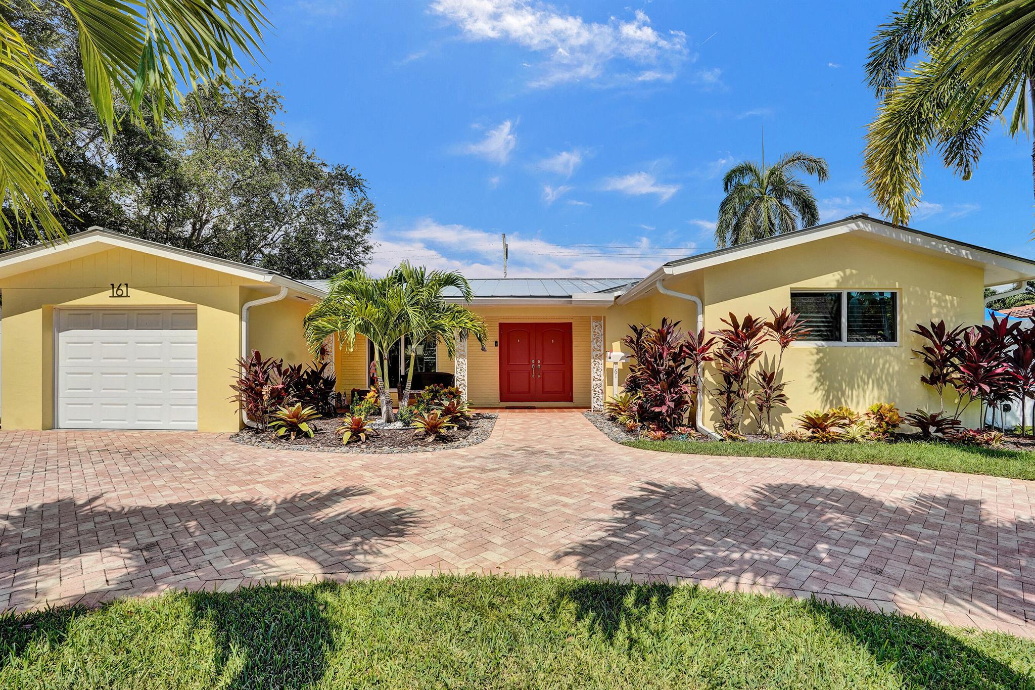 Live the ultimate East Boca lifestyle in this stunning, move-in ready home just minutes from the beach and located in one of Boca Raton's top-rated school districts. With no HOA, this property offers rare freedom in one of the area's most desirable neighborhoods.Designed for both comfort and entertaining, this 3-bedroom, 2-bath concrete block home features a sprawling floor plan with multiple living areas, a huge chef's kitchen with newer appliances and a bonus room off the kitchen perfect for an office or playroom. The primary suite boasts a brand-new master bath (2025), while recent upgrades include a remodeled laundry room (2025), all new interior doors (2025), and custom closets throughout.Step outside to your private backyard paradise with a custom pool, tiki hut, child