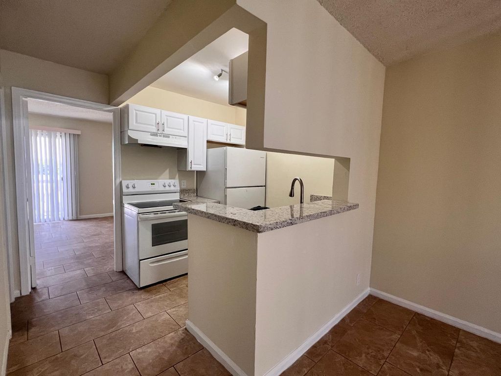 Photo of 1500 N Congress Avenue #A313, West Palm Beach, FL 33401 (MLS # B26024741)
