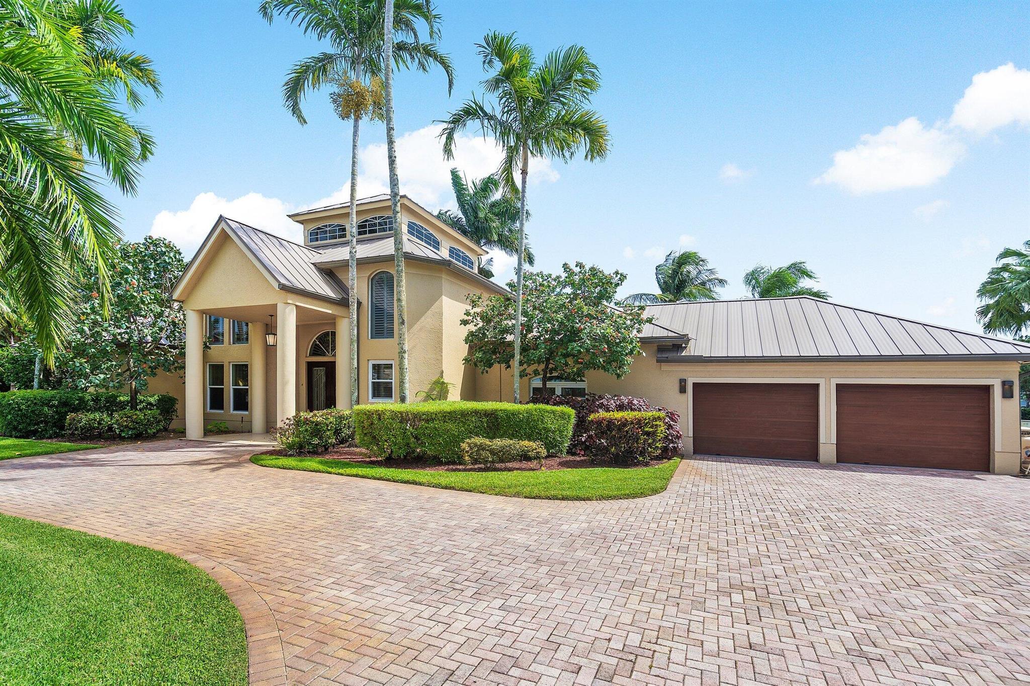 Tucked away on a quiet cul-de-sac in one of Palm Beach Gardens' most coveted locations, this well maintained 3-bedroom plus office, 3.5-bathroom single-family home offers over 3,150 square feet of sophisticated living space. With its superior exterior space, quintessential Florida indoor/outdoor features, along with the seamless blend of upgrades and timeless design, this property is a standout opportunity for the discerning buyer.Peace of mind comes with a 2018 metal roof, impact windows and meticulous attention to detail throughout. Ideally situated just moments from PGA National's world-class golf courses, fine dining, The Gardens Mall, top-rated schools, and pristine beaches. With no HOA, you have the freedom to make it your own.Step through the double doors into a bright,