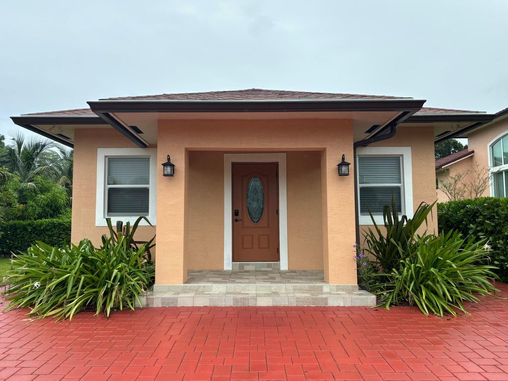 Photo of 4649 Lillian Avenue #A, Palm Beach Gardens, FL 33418 (MLS # B26011102)