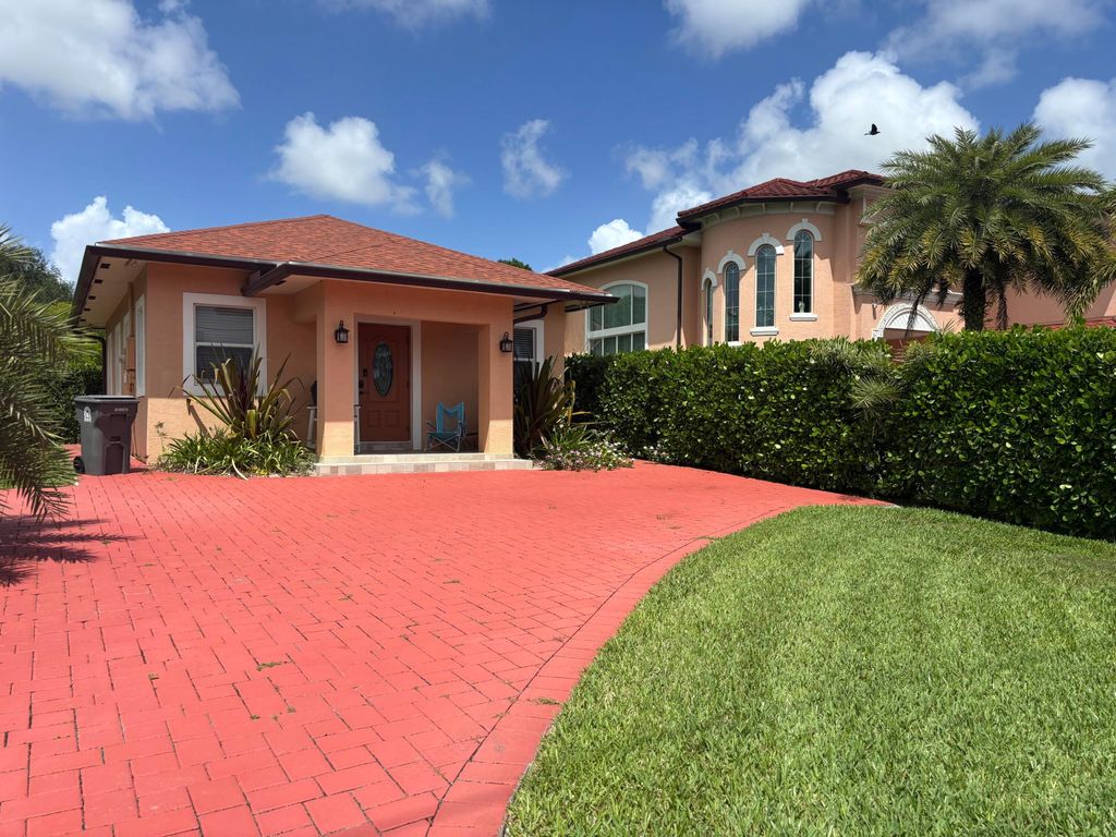 Photo of 4649 Lillian Avenue #A, Palm Beach Gardens, FL 33418 (MLS # B26011102)