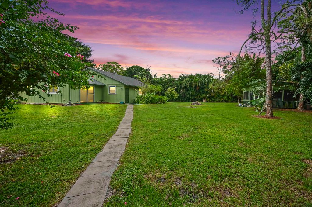 Photo of 14386 82nd Lane N, Loxahatchee, FL 33470 (MLS # R11136394)