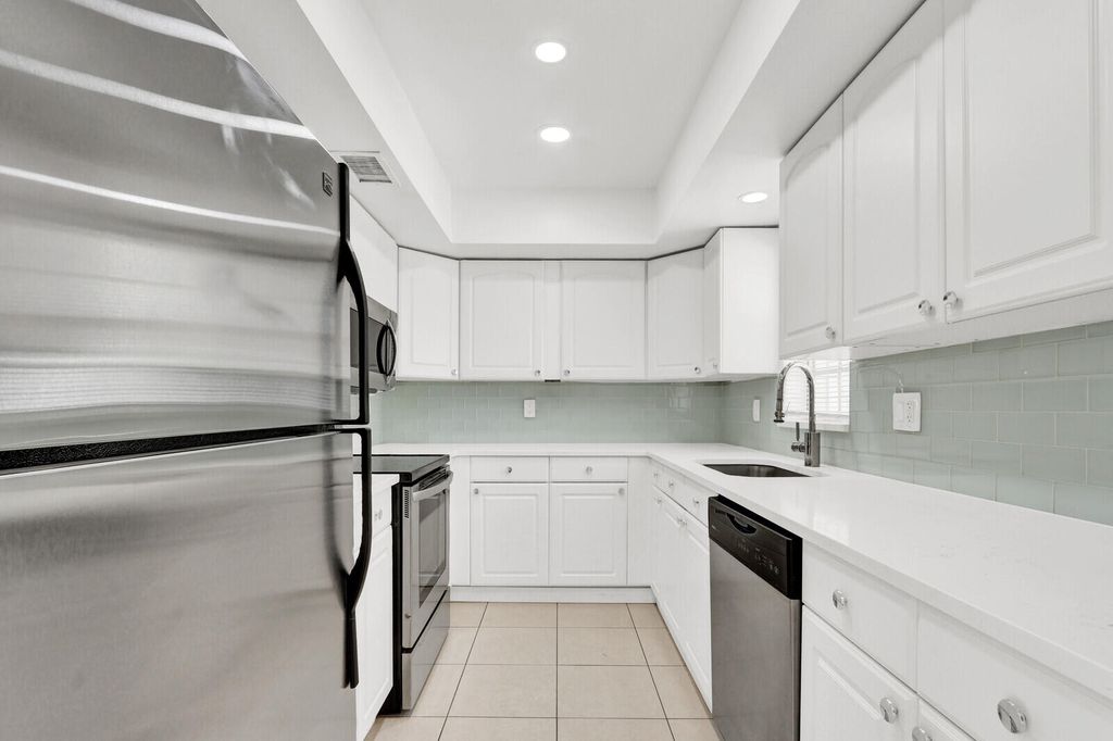 Photo of 10249 N Military Trail #Apt 201, Palm Beach Gardens, FL 33410 (MLS # B26000598)