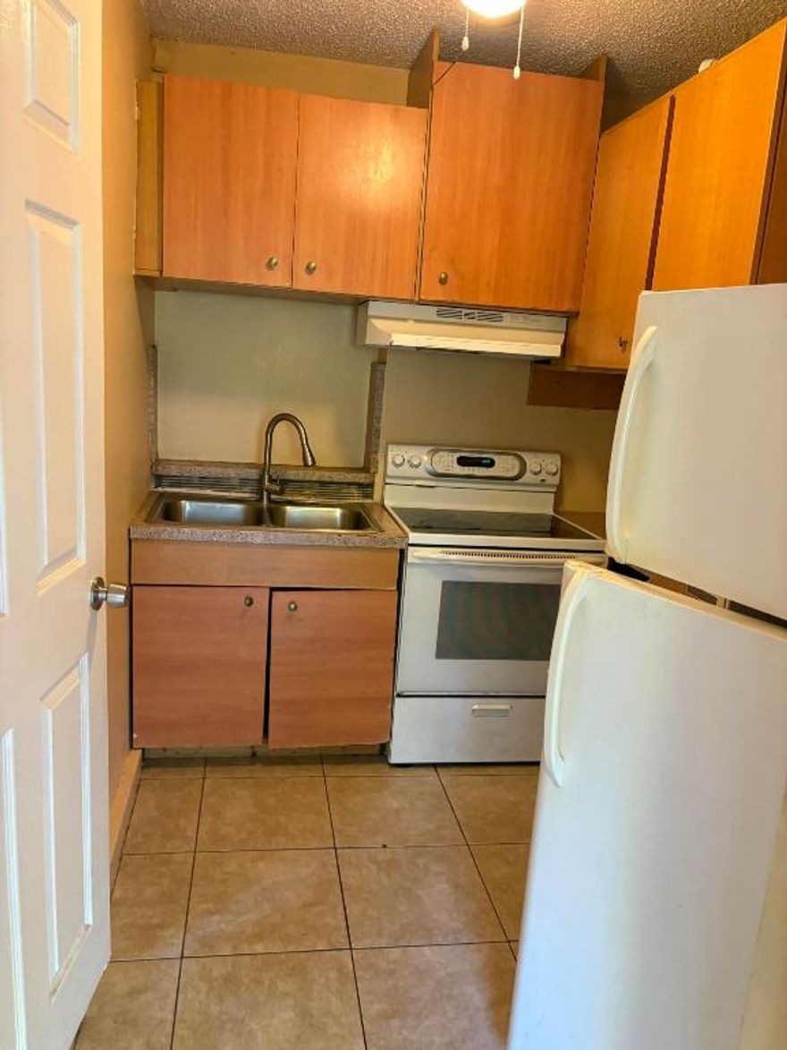 Cozy 1/1 efficiency apartment featuring a private kitchen with a full-size stove and refrigerator, plus a full bathroom. Ideal for comfortable, independent living in a compact space with a private entrance.  Electric, Water, and internet included in monthly rent.