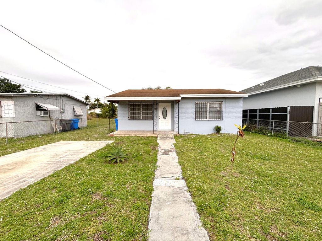 Photo of 4009 SW 24th Street, West Park, FL 33023 (MLS # R11159358)