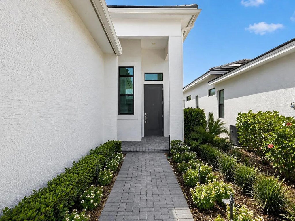 Photo of 9148 SW Esule Way, Port Saint Lucie, FL 34987 (MLS # B26072941)